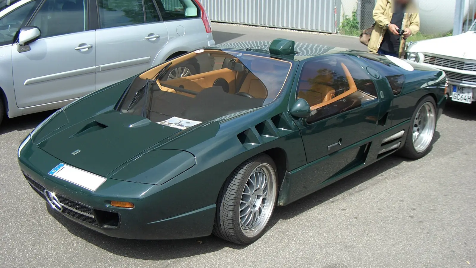 Top 10 Unusual Car Features: Gullwing Doors, Glass Hoods & More
